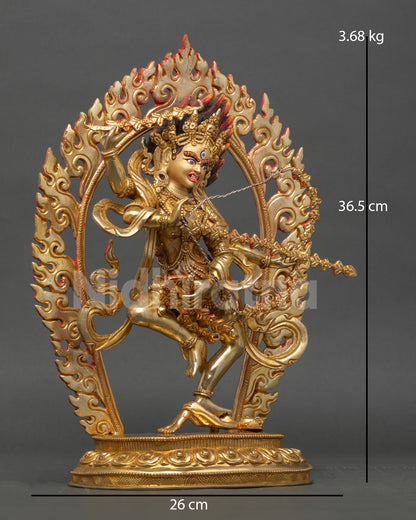 Side view of Kurukulla statue in dynamic standing posture upon lotus throne holding hook noose bow and flower arrows with ritual detail