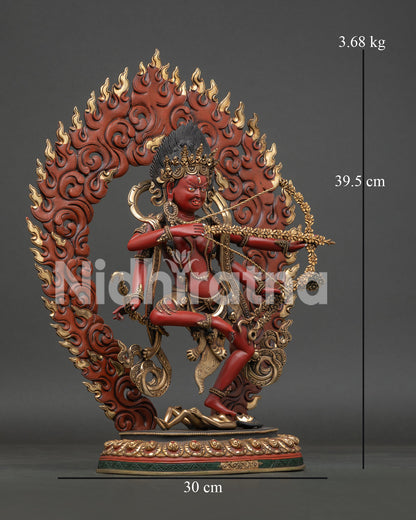 Side view of Kurukulla Statue with four arms holding flower, bow, hook and a noose