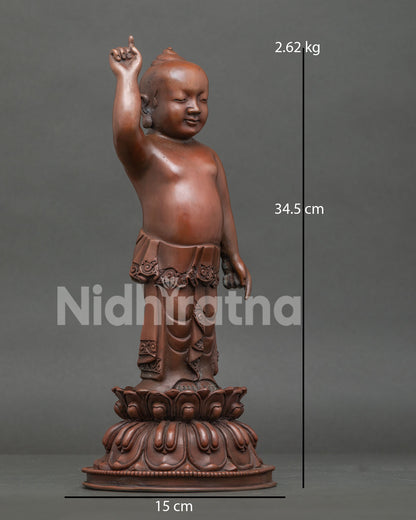 Side View of Little Buddha Copper Statue on Blooming Lotus Pedestal with Tarjani Mudra Hand Gesture
