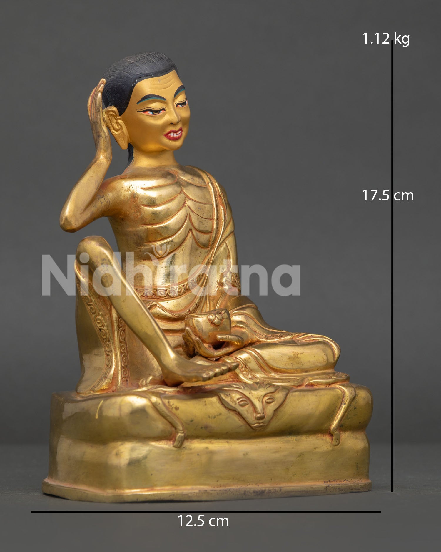 Side View of Milarepa Statue Holding Kapala with Listening Gesture