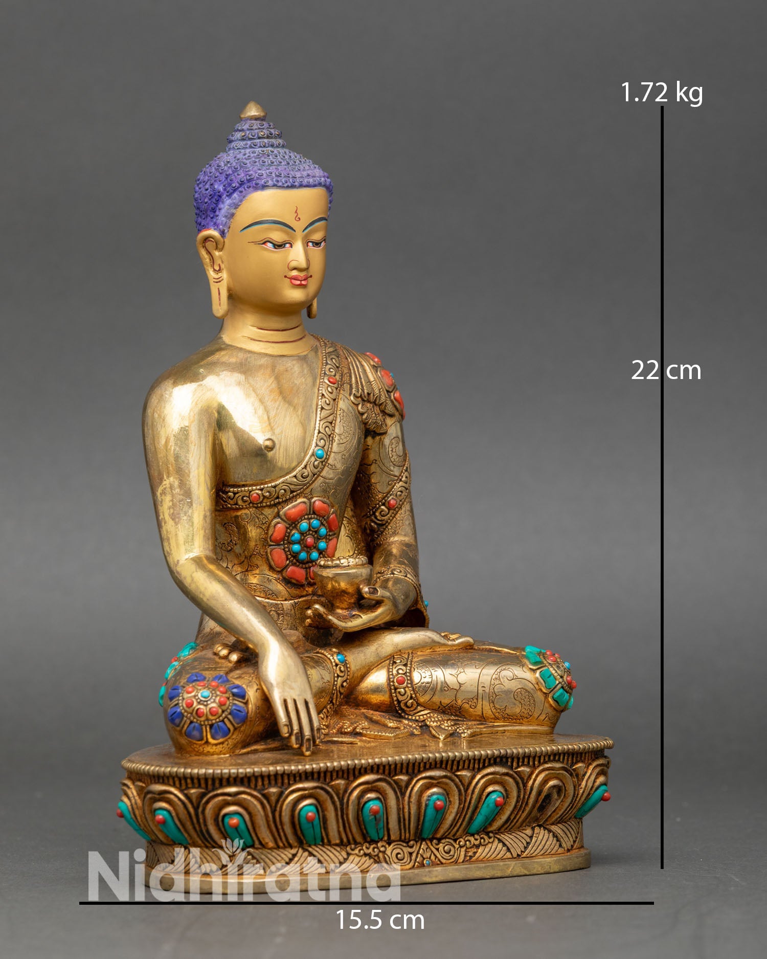 Side view of Nepalese Buddha Shakyamuni seated on a lotus pedestal in Bhumisparsha Mudra