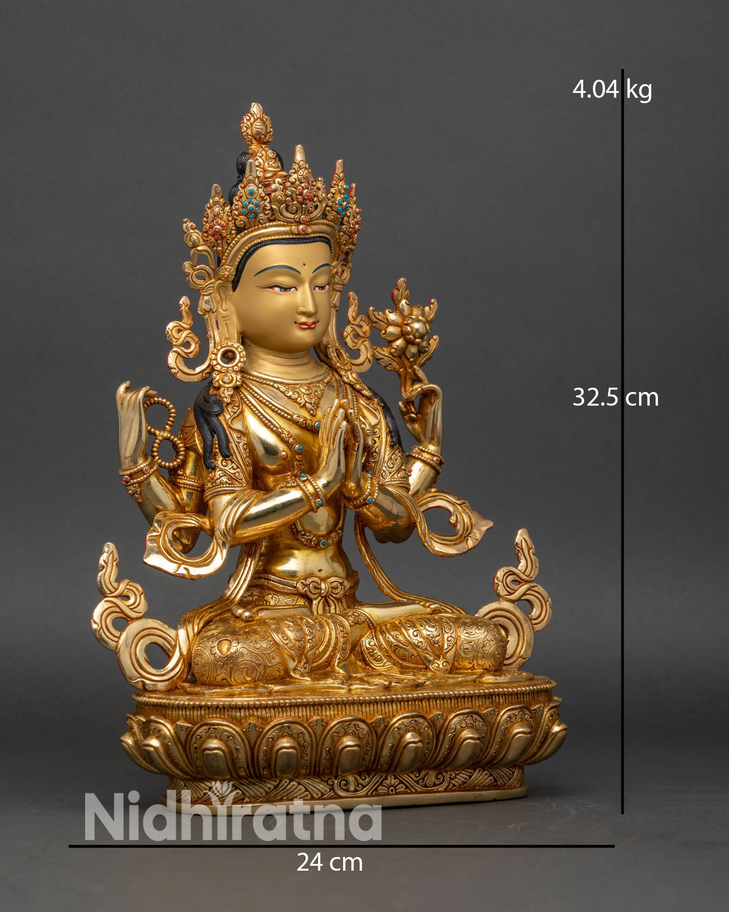 Side view of Nepalese Chenrezig statue holding wish-fulfilling jewel, mala, and lotus