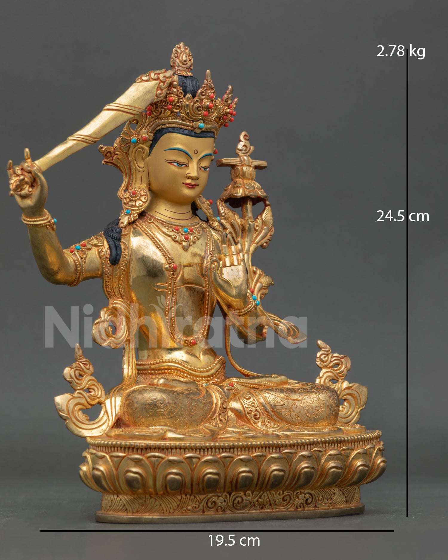 Side view of Nepalese Manjushri Bodhisattva statue with Prajnaparamita Sutra