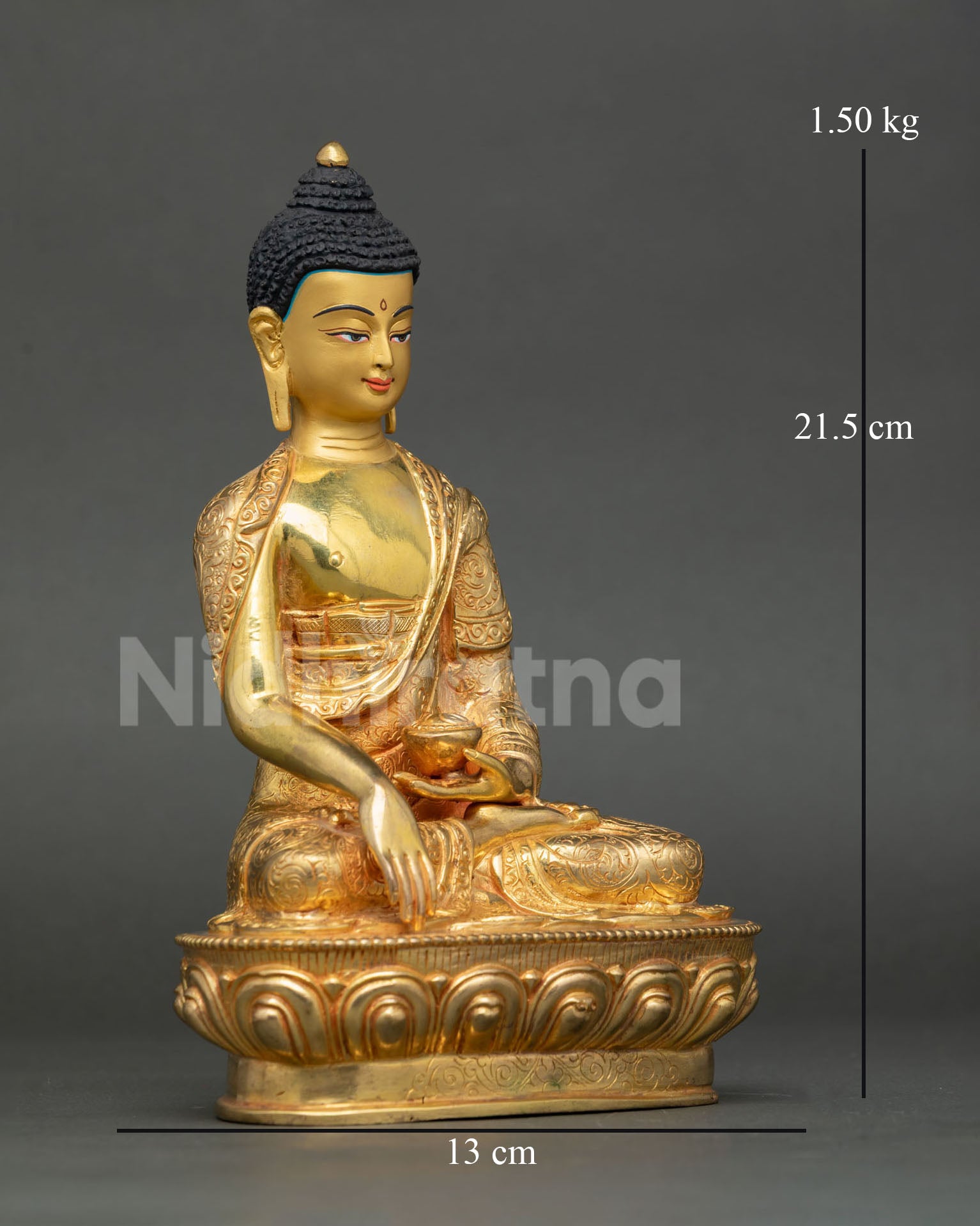 Side view of Nepalese Shakyamuni Buddha statue holding a begging bowl in a seated posture