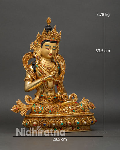 Side view of Nepalese Vajrasattva statue seated on detailed lotus flower pedestal