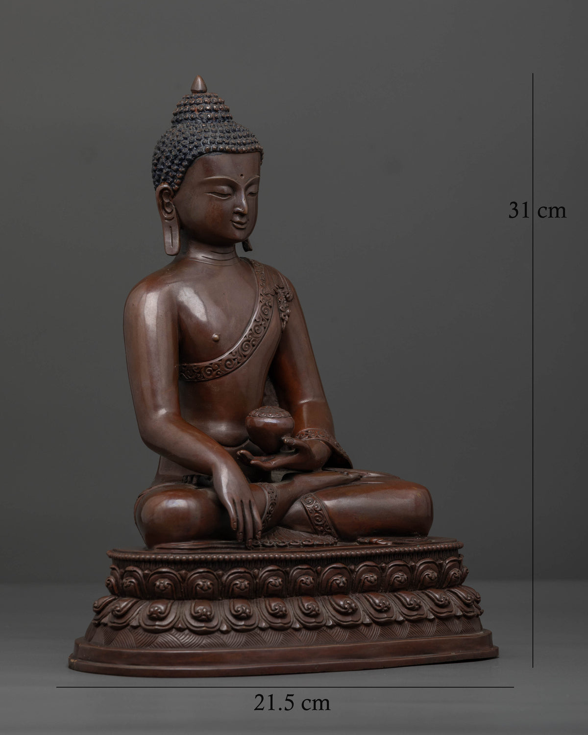 Side view of oxidized Shakyamuni Buddha statue handcrafted by Newari artisans