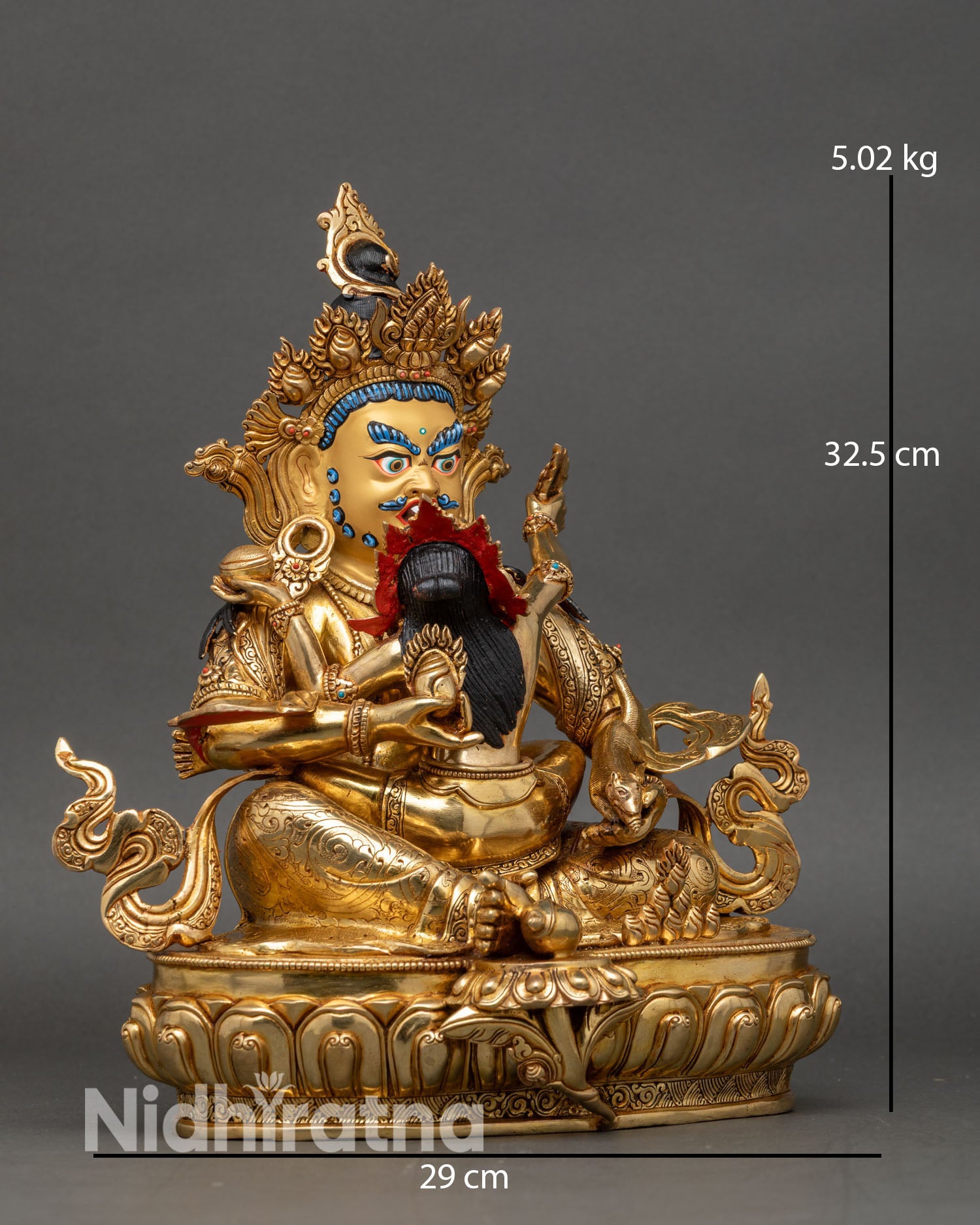 Side view of Red Dzambhala Yab Yum statue holding jewel spitting mongoose and wish fulfilling jewel for prosperity
