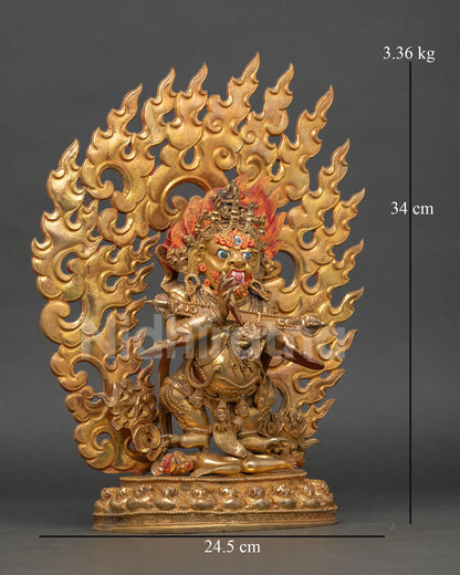 Side view of Sakya Mahakala statue showing lotus seat human figure subjugation and flaming halo design