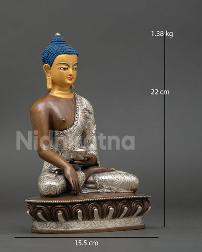 Side view of Shakyamuni Buddha seated in bhumisparsha mudra upon a traditional lotus pedestal.