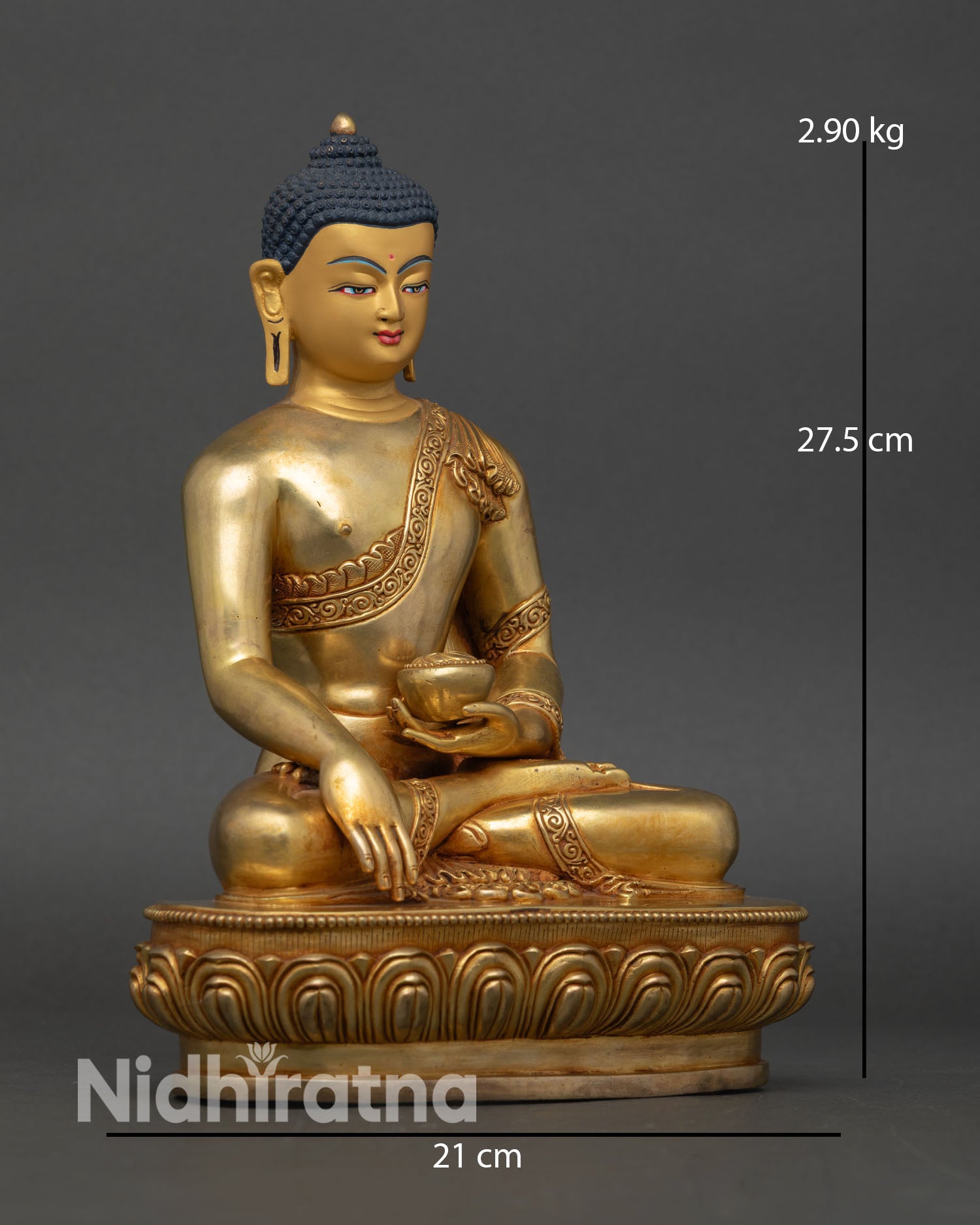 Side view of Shakyamuni Buddha statue earth touching mudra alms bowl meditation sculpture