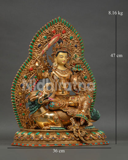 Side view of Simhanada Manjushri statue, displaying wisdom sword utpala flower and Prajnaparamita scripture