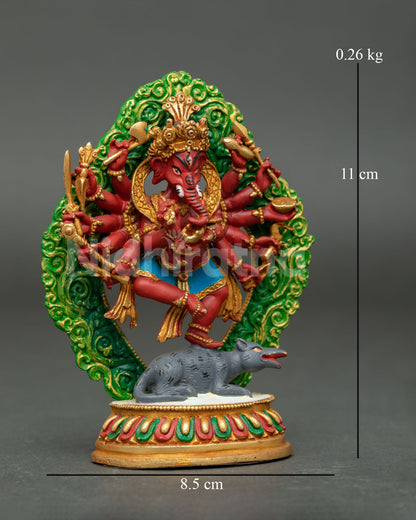 Side view of standing Ganesha statue with raised leg mouse vehicle halo backdrop and finely detailed Nepalese Newari artisan craftsmanship.