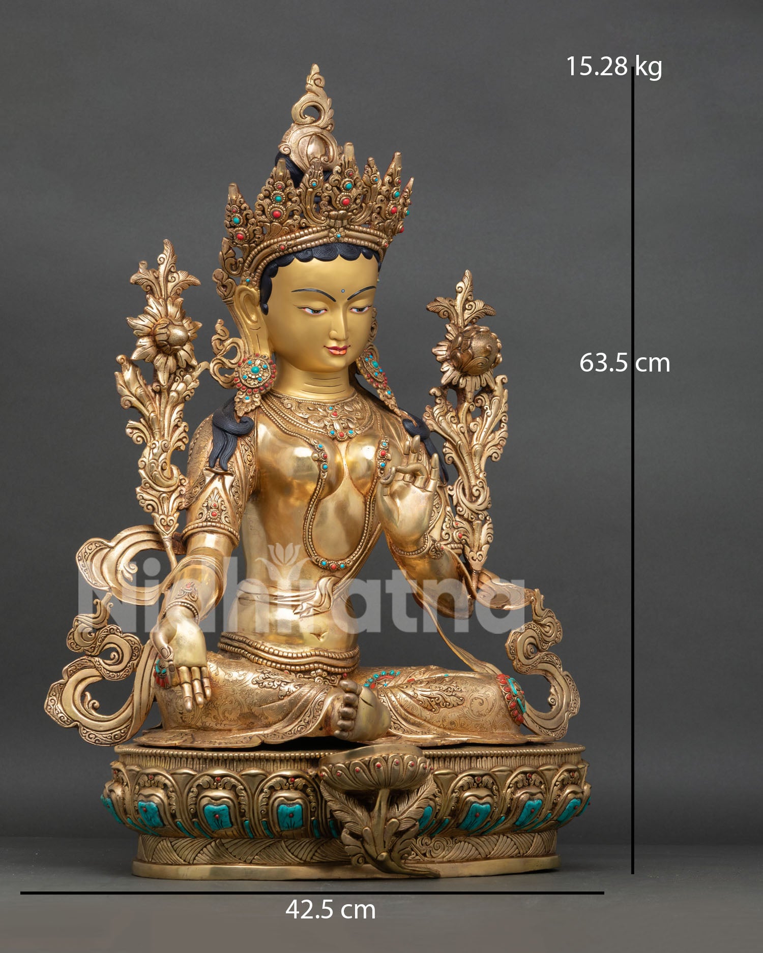 Side view of the gold gilded Green Tara sculpture, displaying the lotus pedestal, flowing robes, and traditional Nepalese metalwork.
