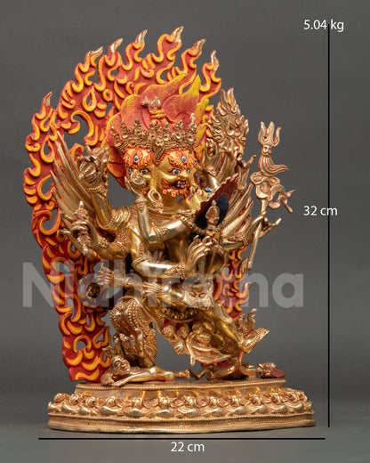 Side view of Vajrakilaya statue in dynamic union posture with consort crafted in copper with gold gilded finish and Himalayan artistry