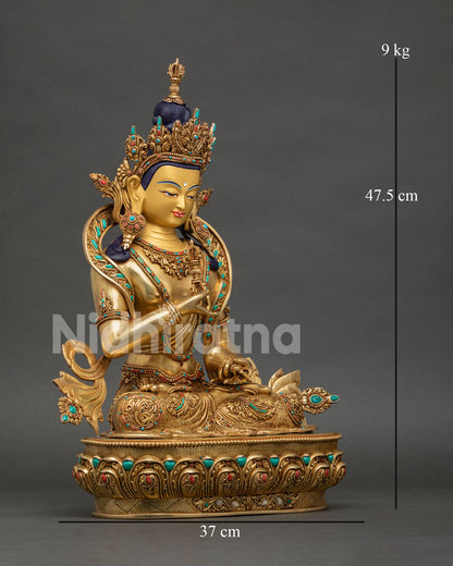Side view of Vajrasattva Buddhist sculpture featuring copper body gold fire gilding and traditional Newari artistry