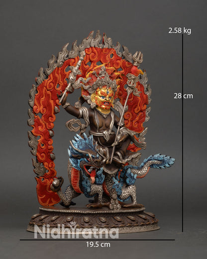 Side view of White Dzambhala statue seated on Dragon Kubera with wealth banner