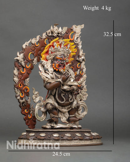 Side view of Sakya Mahakala statue, standing on a lotus seat with hand-painted details