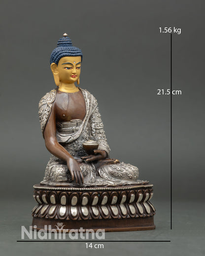Side view of Shakyamuni Buddha holding begging bowl oxidized copper body Himalayan Buddhist meditation statue