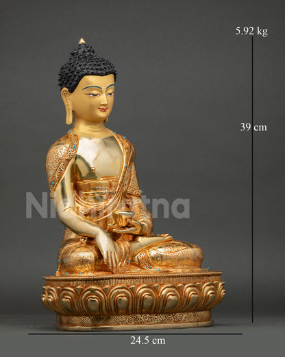 Side view of Shakyamuni Buddha seated meditation posture, earth touching mudra, holding begging bowl, sacred Buddhist altar decor Nepal