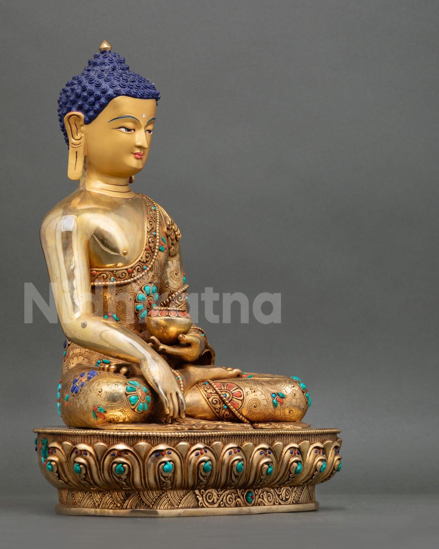 Side view of Shakyamuni Buddha statue Bhumisparsha mudra copper deity sculpture seated lotus base holding begging bowl