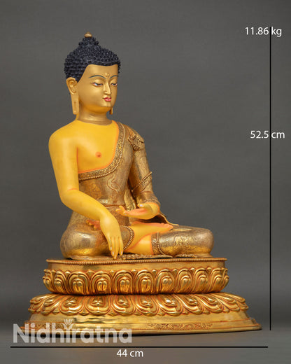 Side view of Shakyamuni Buddha statue Bhumisparsha mudra lotus throne gold gilded accents