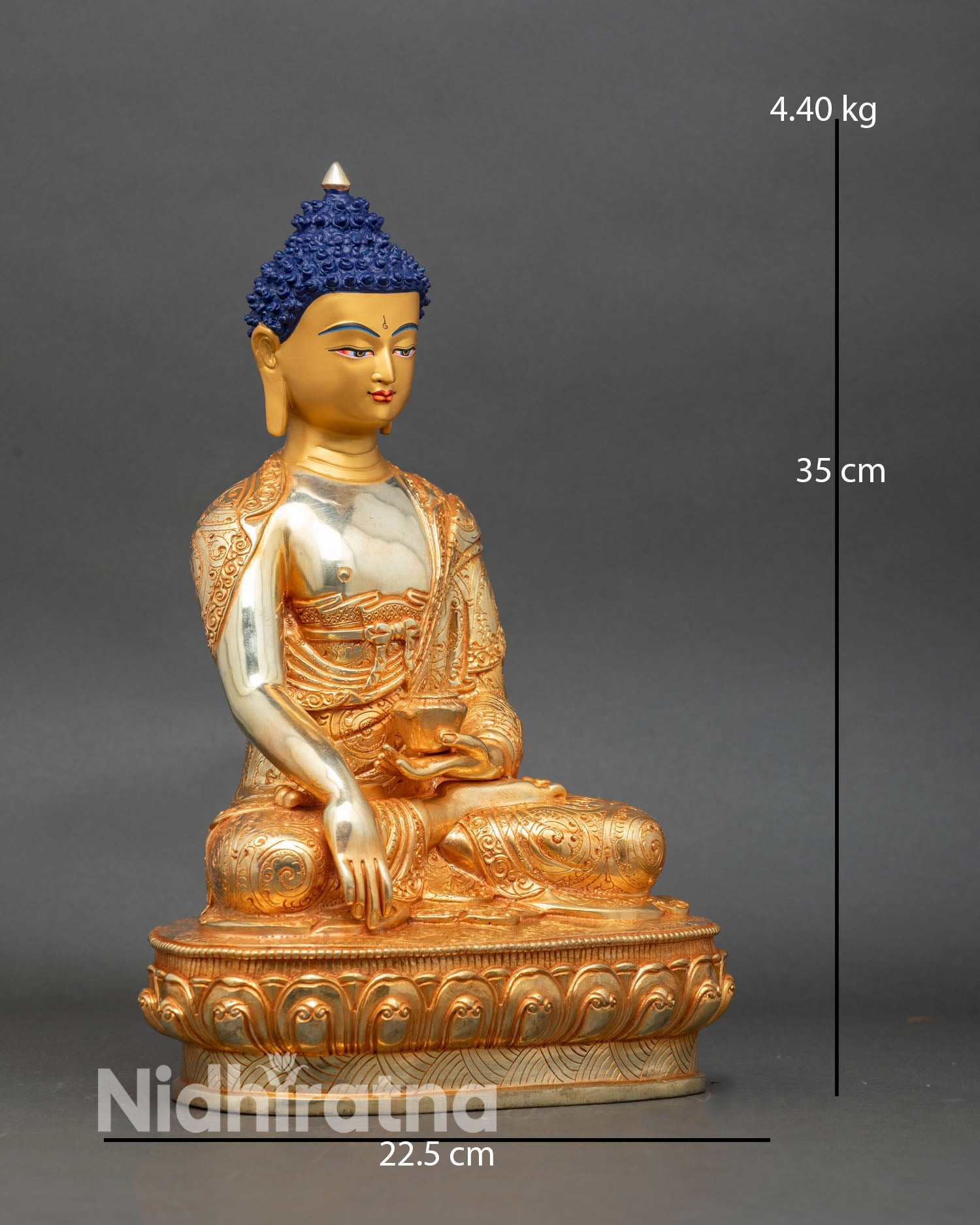 Side view of Shakyamuni Buddha statue meditative posture lotus seat sacred Nepalese art
