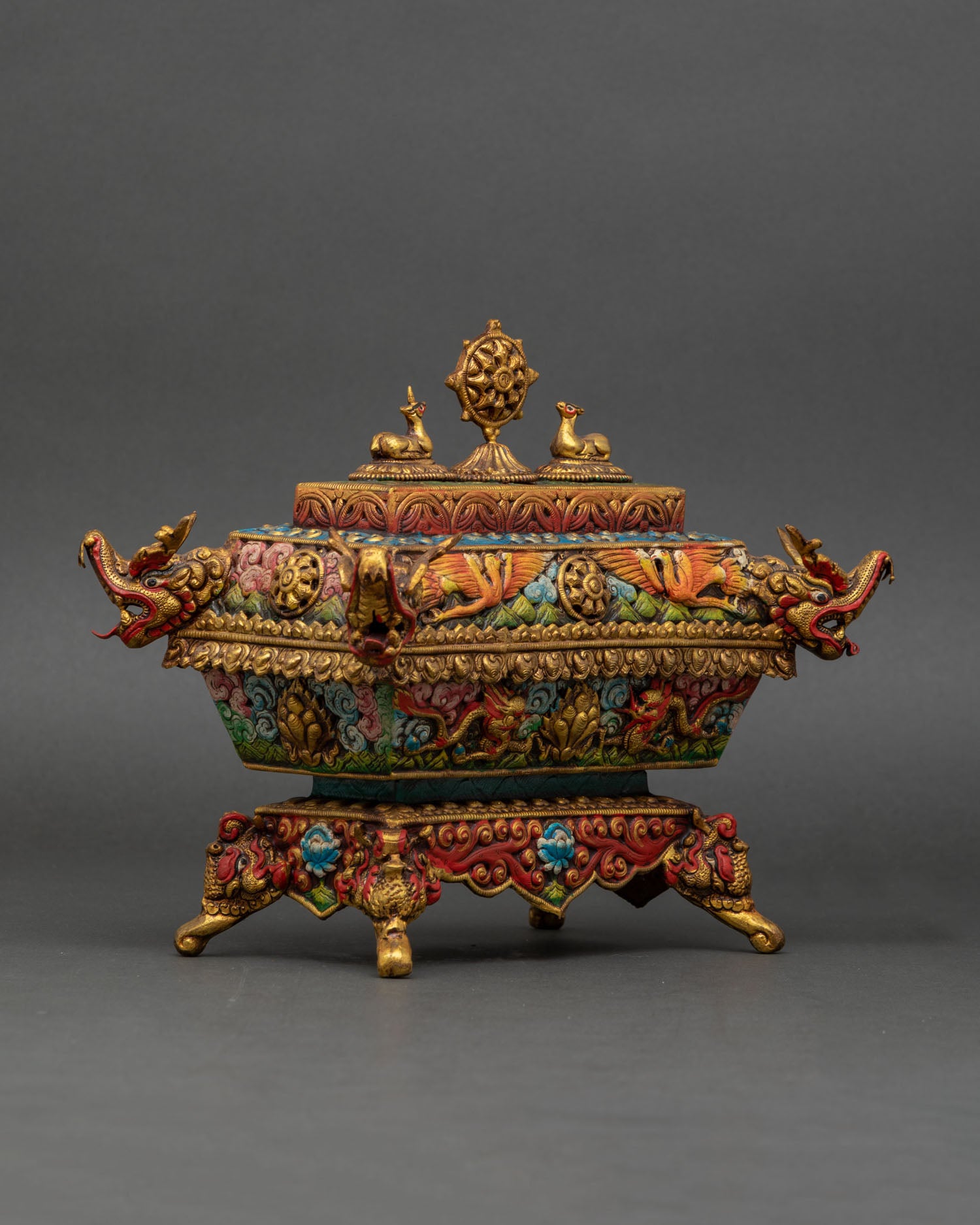 Side view Tibetan incense burner with mythical creatures and auspicious symbols