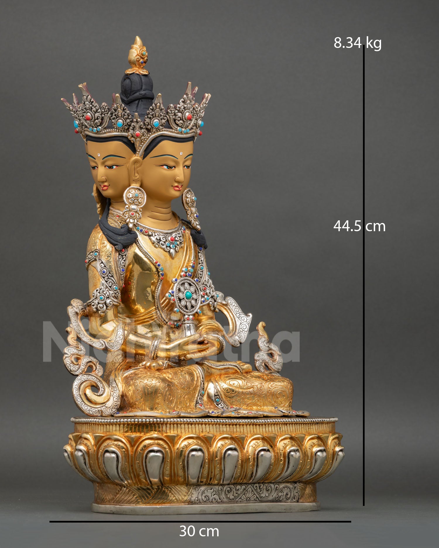 Side view of Vairocana Buddha statue intricate robes floral motifs silver plated details Kathmandu Valley craftsmanship meditation decor