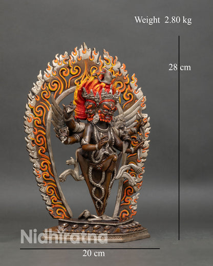 Side view Vajrakilaya statue dynamic posture phurba wings protection and transformation