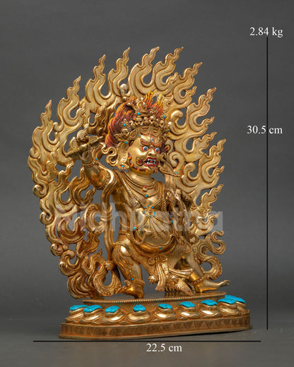 Side view Vajrapani Chana Dorje statue holding vajra and lasso standing in dynamic wrathful posture on lotus base