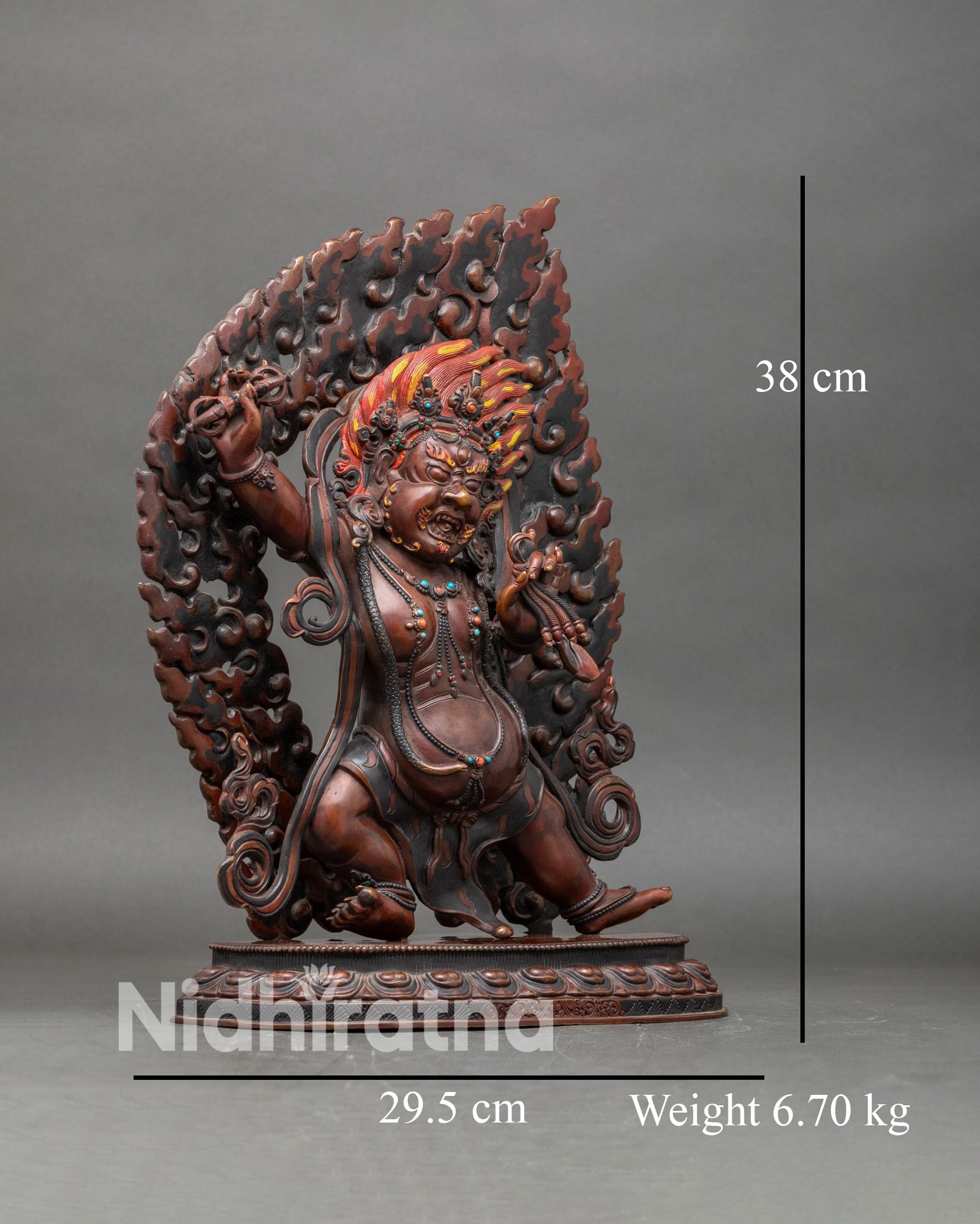 Side view Vajrapani statue intricate robes lotus base protective Buddhist guardian