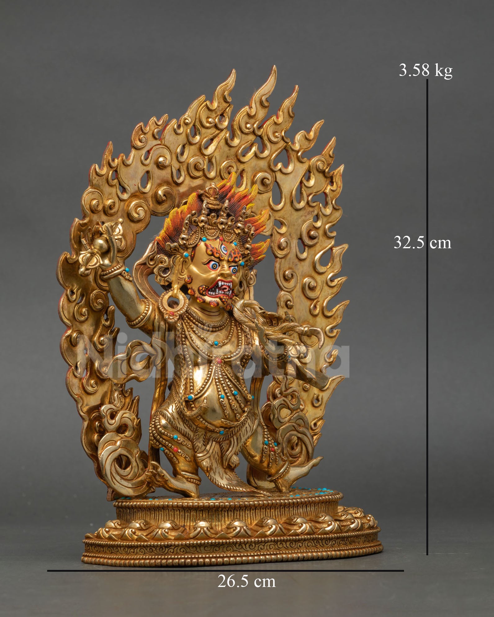 Side view Vajrapani statue standing on lotus pedestal holding vajra and lasso with ornate Buddhist details