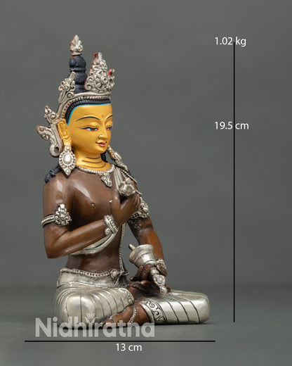 Side view of Vajrasattva seated holding vajra and bell copper purification deity statue Vajrayana meditation decor Nepal