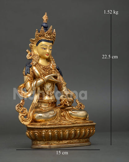 Side view of Vajrasattva statue, copper body seated on lotus base, Himalayan Buddhist purification deity sculpture 