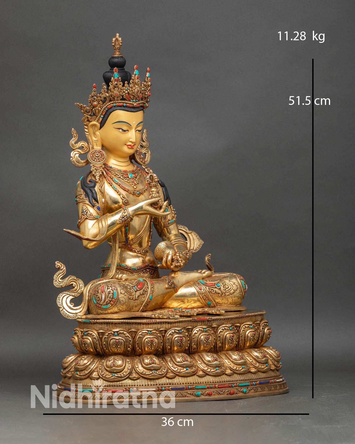 Side view of Vajrasattva statue seated on a lotus pedestal, handcrafted Nepalese sacred deity.
