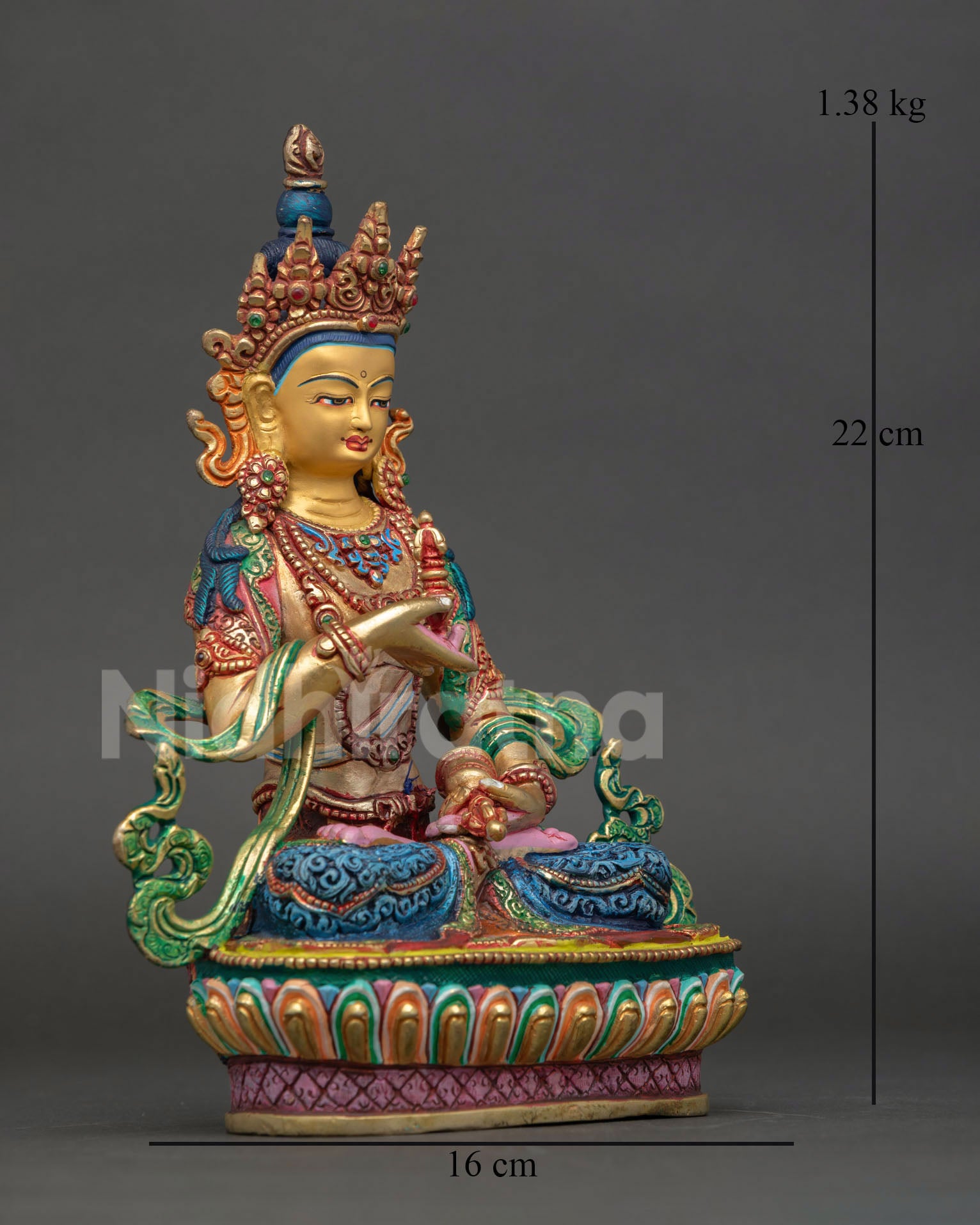 Side view of Vajrasattva statue seated on lotus pedestal holding vajra and bell with intricate Nepalese craftsmanship and gold gilded finish