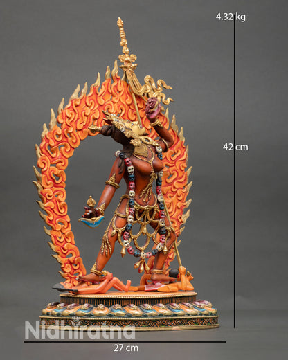 Side view Vajrayogini standing on subdued figures holding trident kartika knife skull cup Nepal copper dakini for tantric ritual meditation
