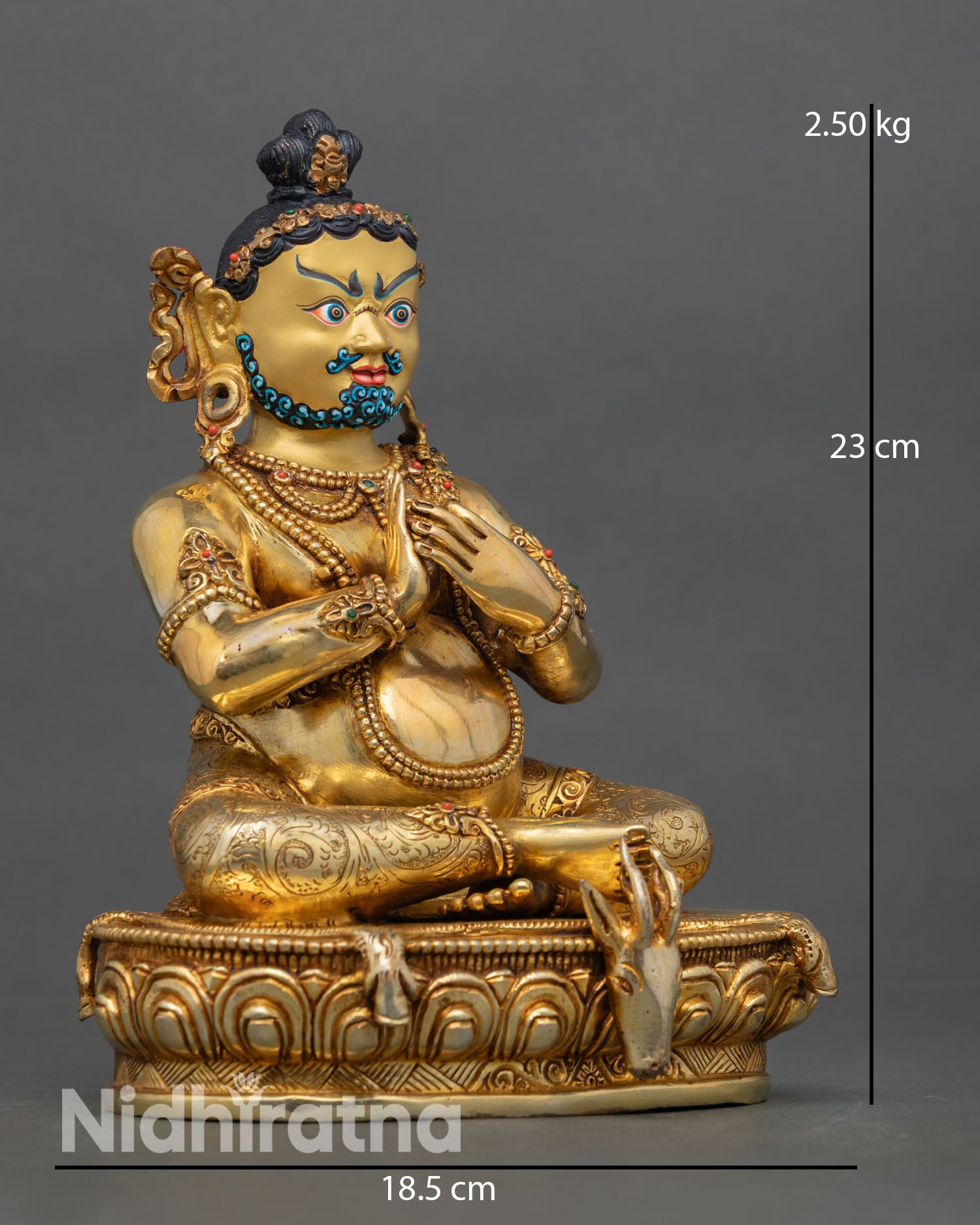 Side view of Virupa statue lotus throne deer skin seat Dharmachakra mudra Tibetan Buddhist spiritual art Nepal sculpture