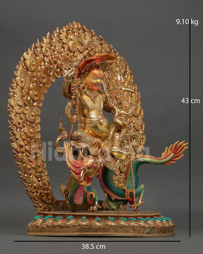 Side view of White Dzambhala statue fire gilded body flowing robes radiant halo intricate Himalayan Buddhist art copper sculpture prosperity and abundance decor
