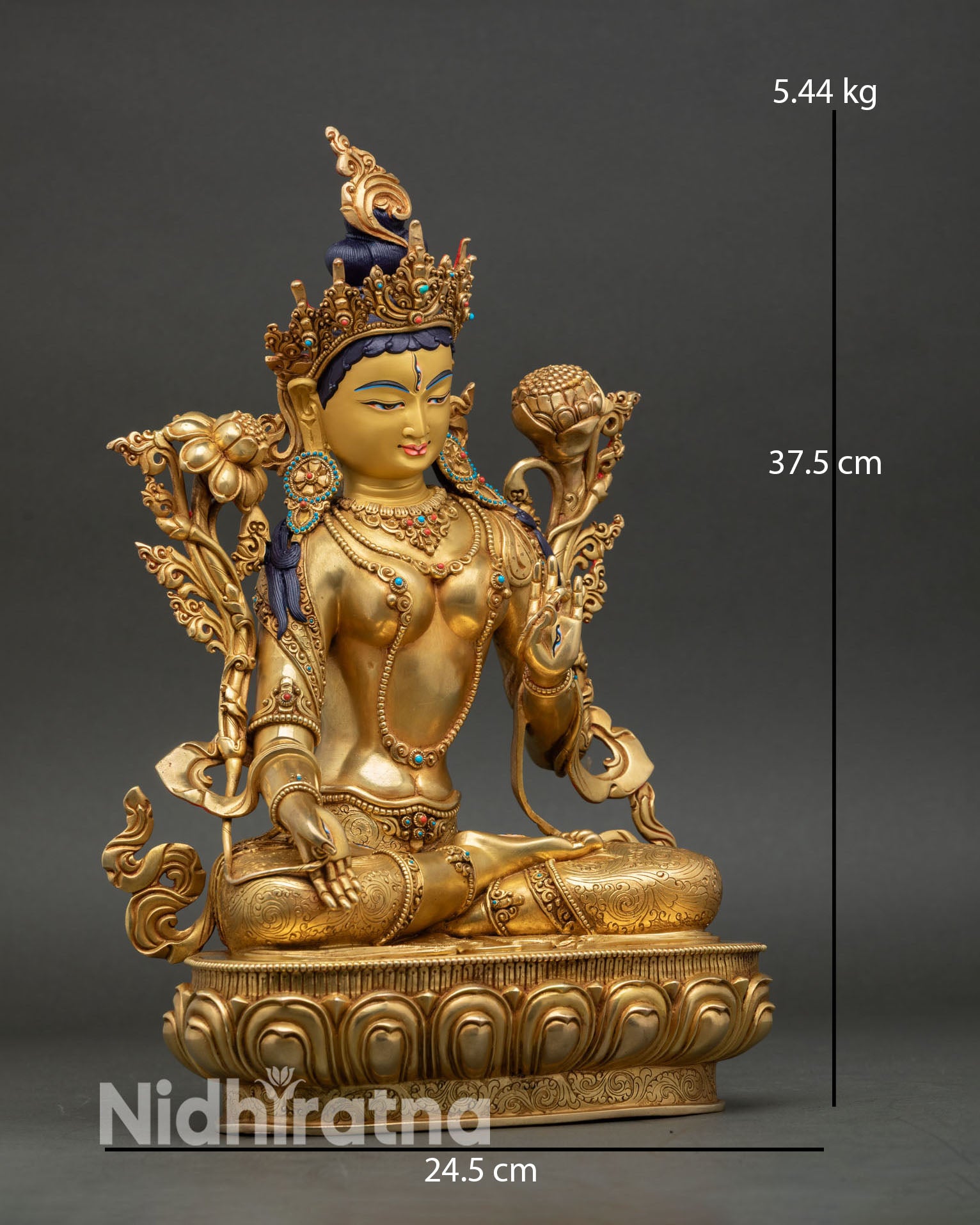 Side view White Tara, handmade copper statue with gold accents  symbolic posture 