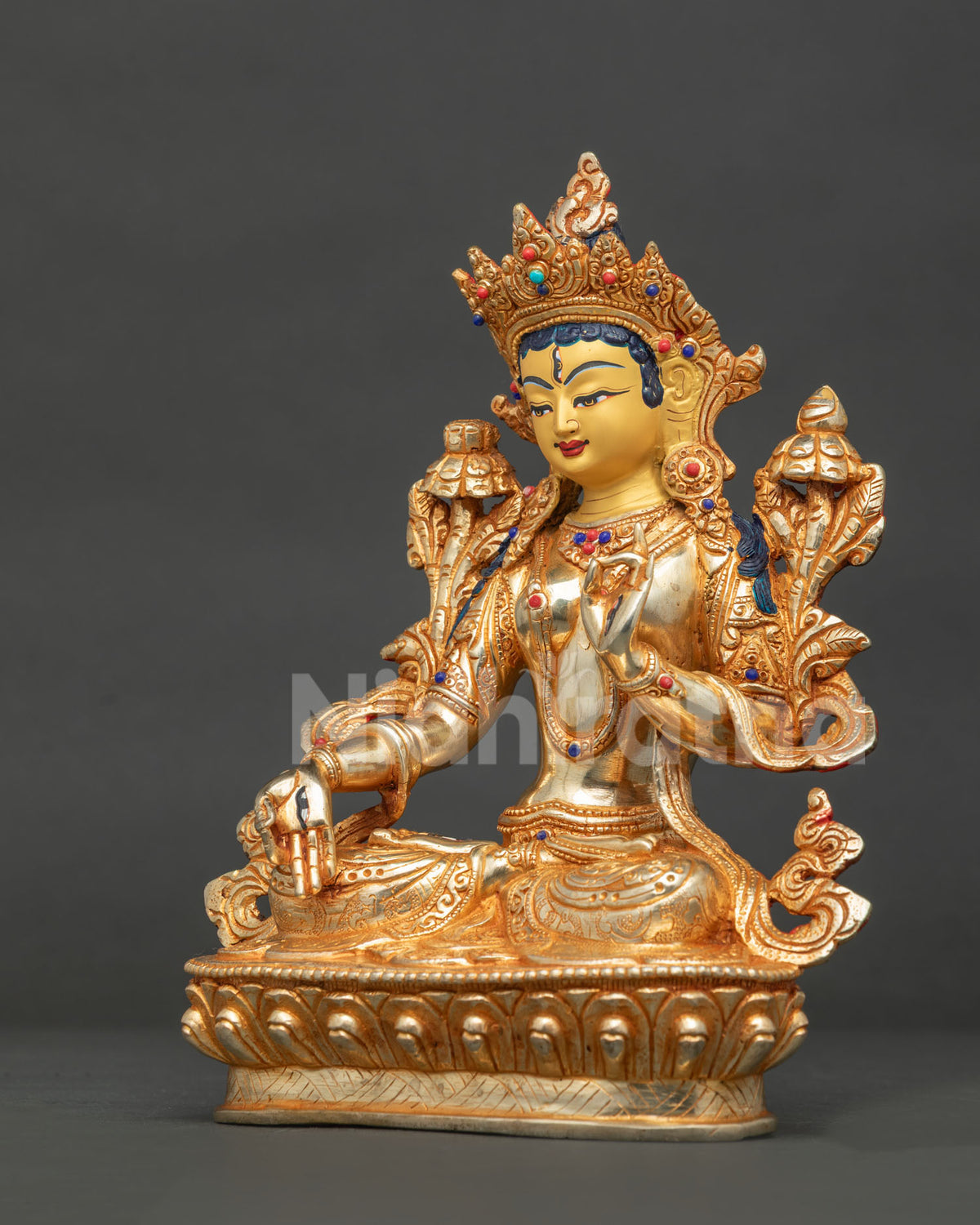 Side view White Tara statue lotus flowers hand carved lotus pedestal.