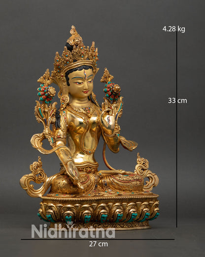 Side view of white tara statue varada mudra utpala lotus copper sculpture lost wax casting craftsmanship