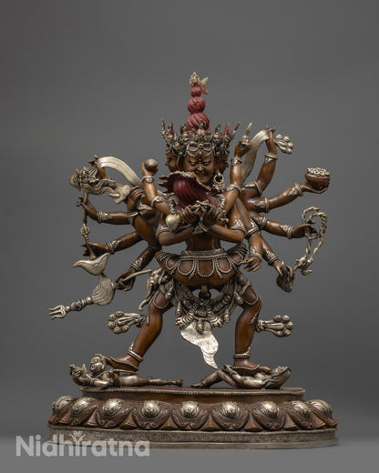 side angle Kalachakra Statue in oxidized copper with silver plated finish and flowing robes