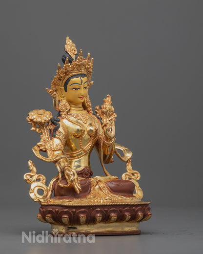 side angle White Tara Sculpture highlighting carved robes, lotus seat, and sacred symbolism
