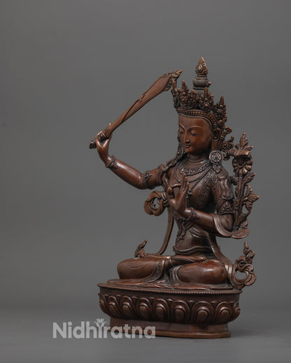 side angle of Manjushri statue seated in on lotus base
