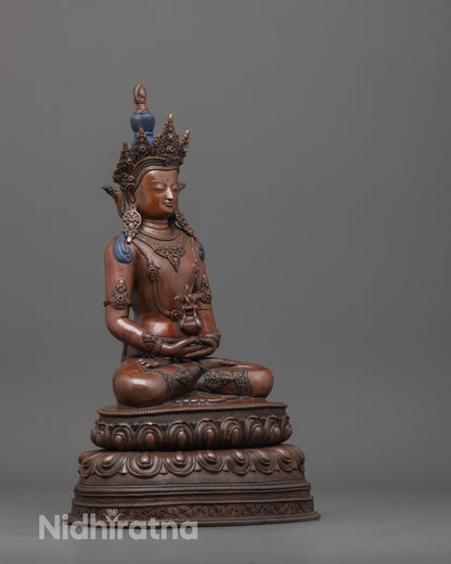 side angle of Tibetan Amitayus statue seated in meditation with oxidized copper body finish