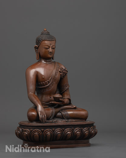 side angle of handcrafted Gautama Buddha statue holding patra bowl in bhumisparsha mudra