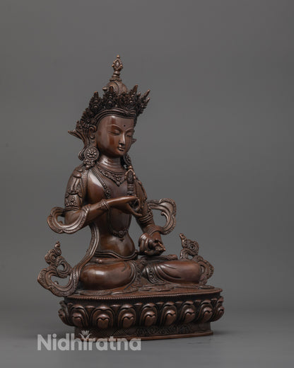 side angle of handmade dorje sempa statue showing intricate lost wax carving work