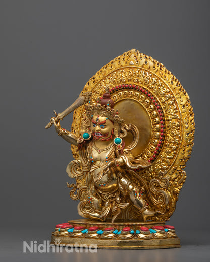 side angle of manjushri statue showing sword of wisdom and gemstone-adorned halo