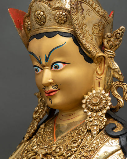 side face close up padmasambhava sculpture, refined facial features, fire gilded copper and sacred buddhist iconography